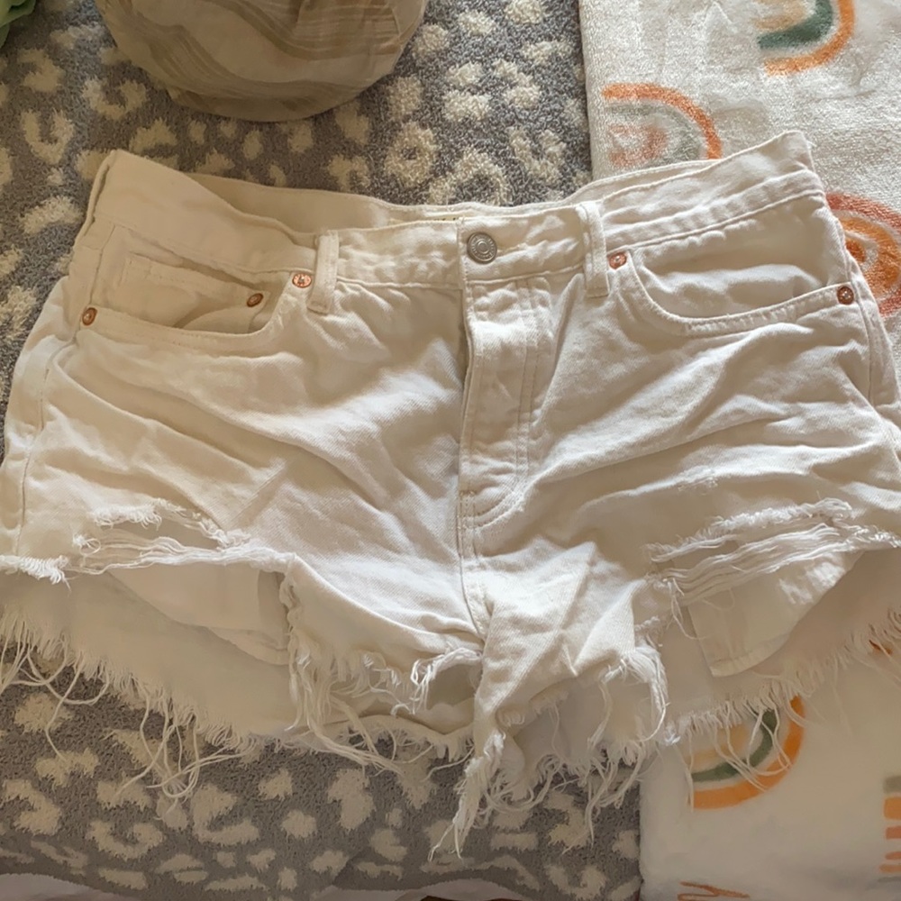 Free people distressed white button fly shorts